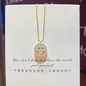 necklace with smiley face
