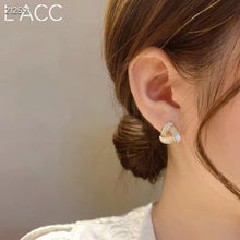 white shell earrings